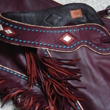 Maroon schooling chaps with various color accents